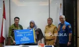 TASPEN Salurkan Manfaat JKK dan THT bagi Ahli Waris Petugas Damkar DKI Jakarta yang Gugur