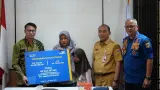 Penyaluran Manfaat TASPEN Bagi Ahli Waris Petugas Damkar DKI Jakarta yang Gugur
