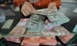 Dampak Pembatalan Serangan Amerika Serikat ke Iran terhadap Potensi Penguatan Rupiah